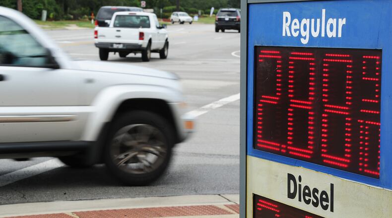 Traffic moves along Woodman Ave. in Kettering, Tuesday Aug. 31, 2021. Gas prices are likely to increase for the Labor Day holiday due to hurricane Ida. MARSHALL GORBY\STAFF
