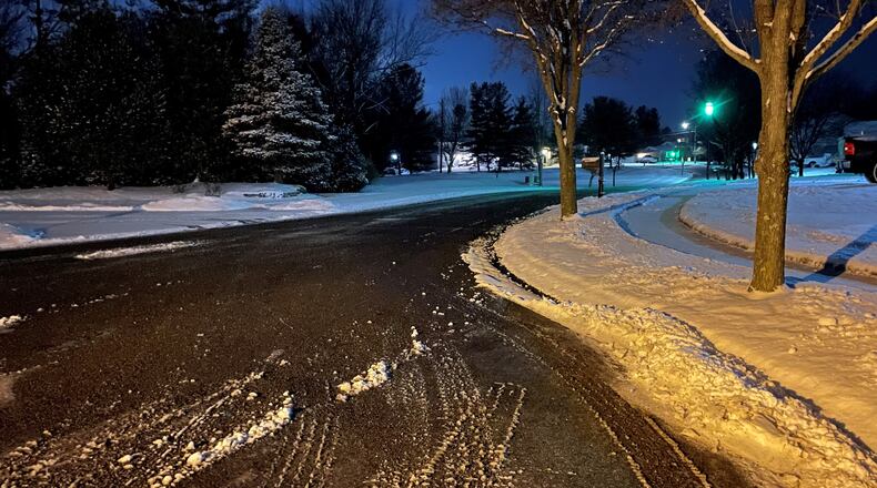 A view of Cody Court in Fairfield on Friday night, Jan. 28, 2022, shows where city crews have cleared and treated the roadway after a reported 3 inches of snow fell. CONTRIBUTED