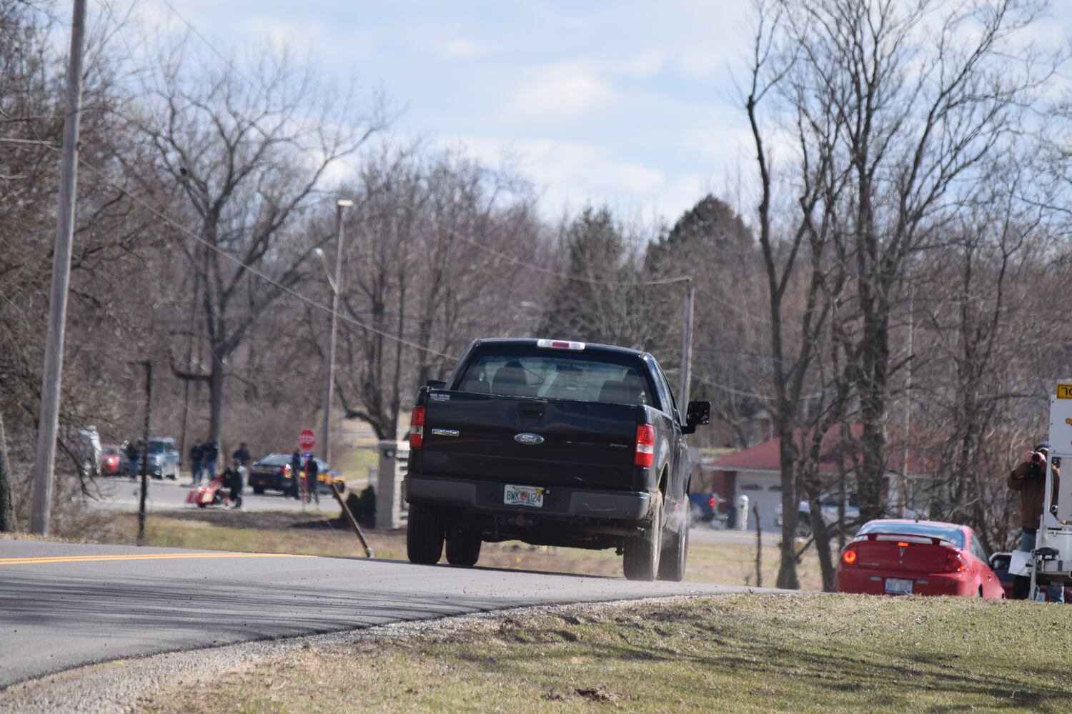 PHOTOS: Thousands of Outlaws attend motorcycle gang leaders funeral at Montgomery County Fairgrounds.