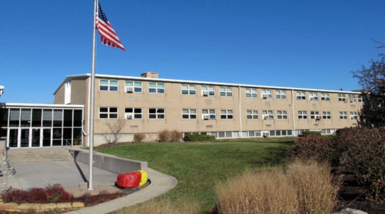 The St. John XXIII Catholic School in Middletown was on lockdown for a short time this morning after a man tried several doors attempting to gain entry to the building. Middletown Police stopped and questioned the man shortly after.
