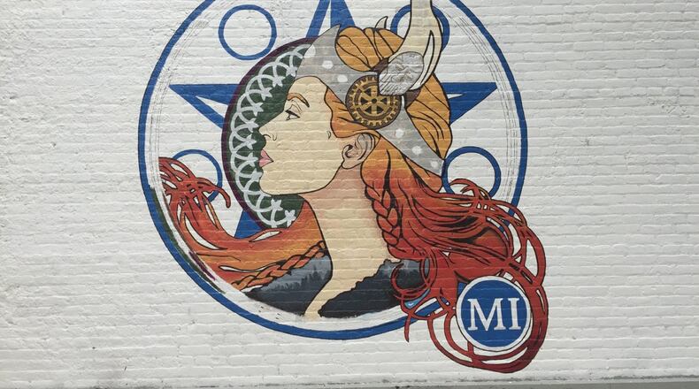 A mural of a lady viking painted on Miamsburg’s Gwinner Building. CONTRIBUTED