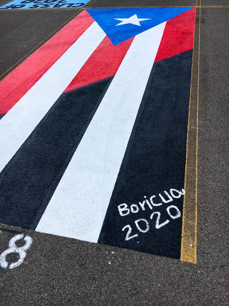 PHOTOS Lakota East seniors paint parking spots