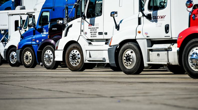 Tractor-trailers are parked at the rest area just south of the Monroe exit on southbound I-75 in Liberty Twp.