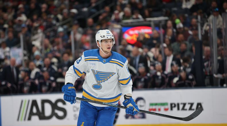 FILE - St. Louis Blues forward Alexei Toropchenko skates during an NHL hockey game against the Columbus Blue Jackets in Columbus, Ohio, Nov. 1, 2025. (AP Photo/Paul Vernon, File)