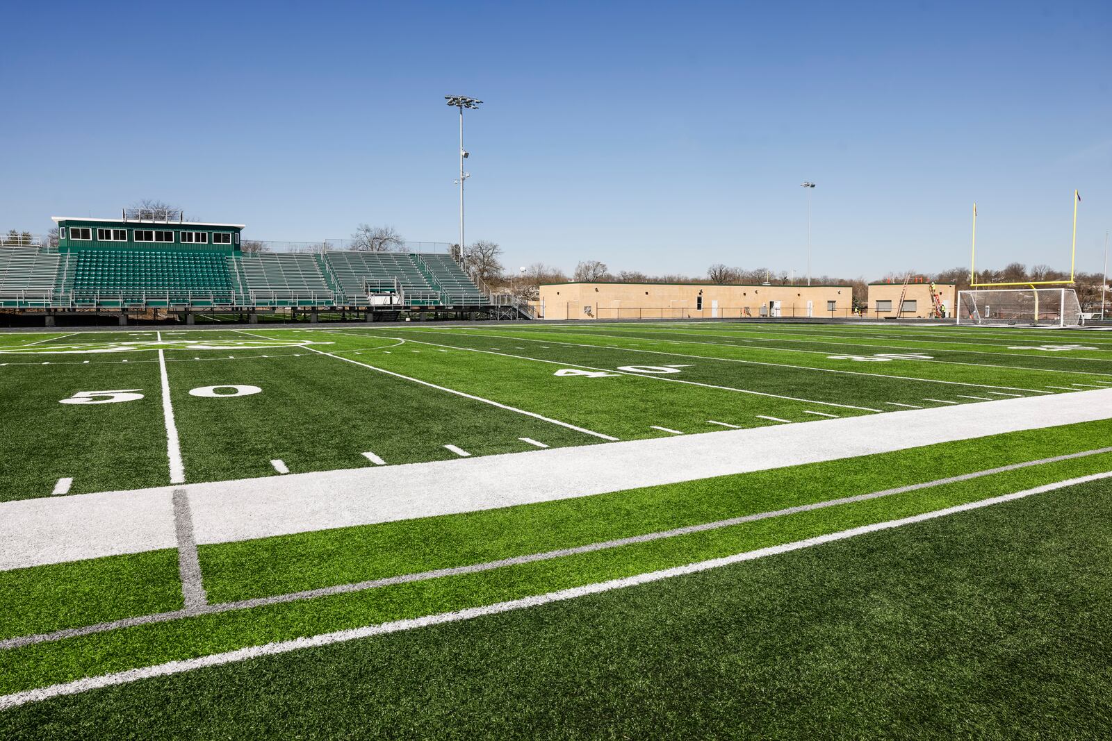 Construction continues Tuesday, March 18, 2025 on the Lanni Family Stadium at Matandy SportsPlex with concession stands, locker rooms and a turf practice field at Badin High School in Hamilton. The complex featuring Coach Terry Malone Field with an eight lane track around it is scheduled to be completed for fall sports seasons. NICK GRAHAM/STAFF