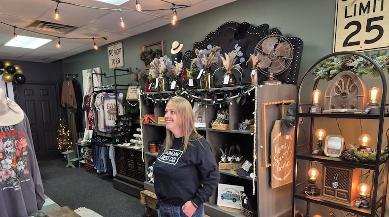 Tina Lamb, owner of Sunday Best Co. on Main Street in Franklin, says her new boutique is a combination of "woodsy" and "industrial." MICHAEL KURTZ / STAFF