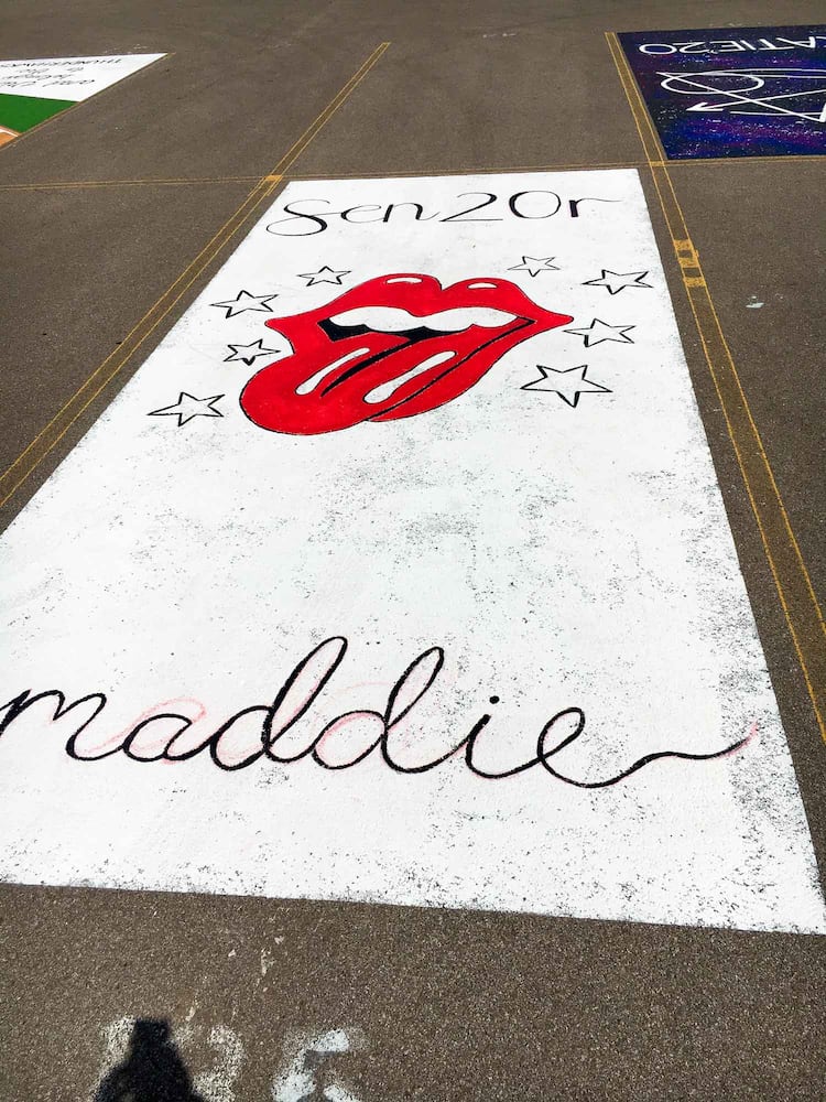 PHOTOS Lakota East seniors paint parking spots