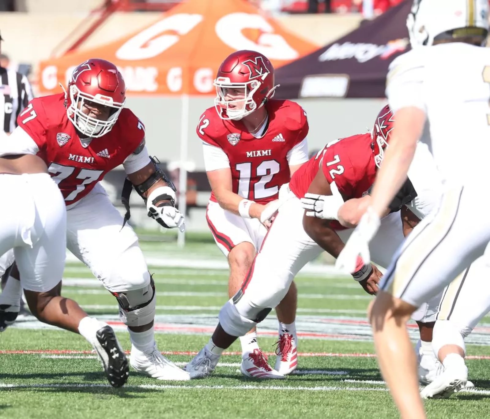 Miami University quarterback Henry Hesson prepares to hand the ball off during their game against Lindenwood University on Saturday, Sept. 27 at Yager Stadium in Oxford. The RedHawks won 38-0. JEFFREY SABO / CONTRIBUTED PHOTO
