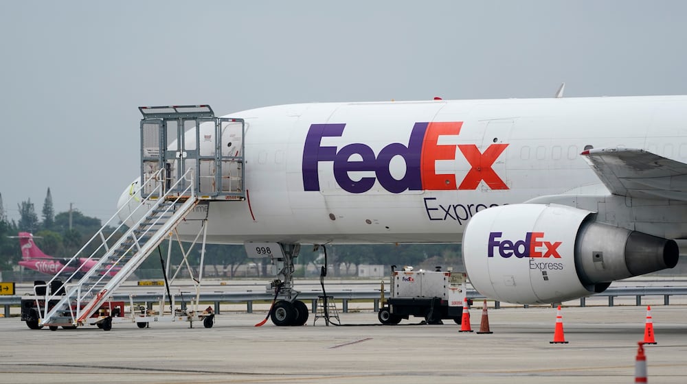 FILE-A FedEx cargo plane is shown on the tarmac at Fort Lauderdale-Hollywood International Airport, Tuesday, April 20, 2021, in Fort Lauderdale, Fla. (AP Photo/Wilfredo Lee, File)