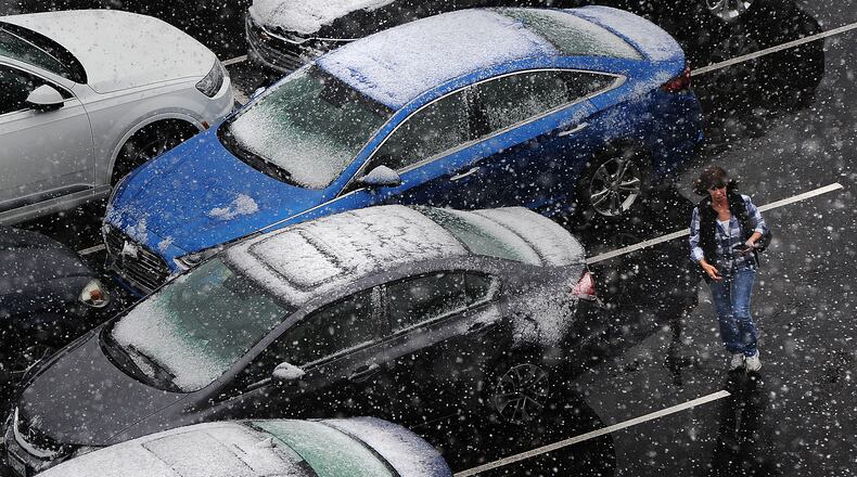 Rain and snow showers most of Monday April 18, 2022 in the Dayton area. MARSHALL GORBY\STAFF