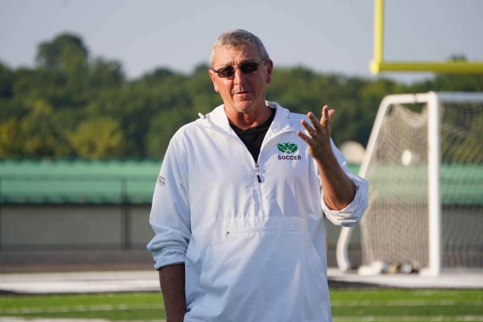 Badin boys soccer coach Eric Hickey talks to his players during their game against Elder on Friday night at the Matandy SportsPlex in Hamilton. CHRIS VOGT / CONTRIBUTED