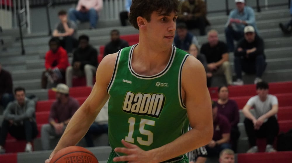 Badin’s Bryson Bowling dribbles the ball during his Division III district semifinal game against Turpin on Wednesday night at Princeton. CHRIS VOGT / CONTRIBUTED