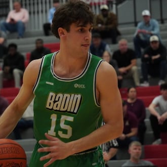 Badin’s Bryson Bowling dribbles the ball during his Division III district semifinal game against Turpin on Wednesday night at Princeton. CHRIS VOGT / CONTRIBUTED