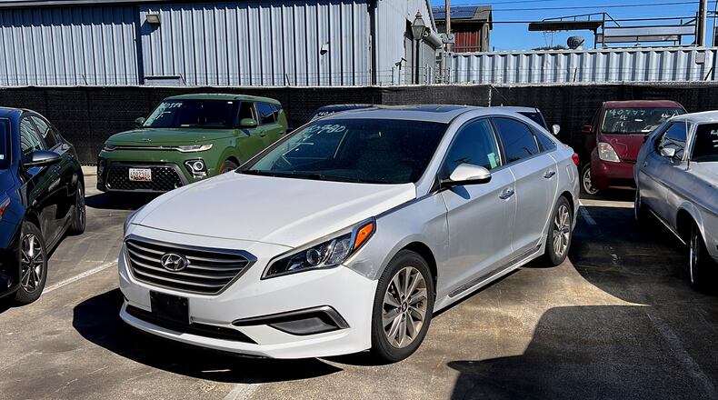 A Hyundai sedan sits in the parking lot of East Bay Tow Inc., where Attorney General Rob Bonta held a news conference, Thursday, April 20, 2023, in Berkeley, Calif., about the surge in thefts of KIA and Hyundai vehicles. Attorneys general in 16 states on Thursday urged the federal government to recall millions of Kia and Hyundai cars because they are too easy to steal; a response to a sharp increase in thefts fueled by a viral social media challenge. (AP Photo/Terry Chea)