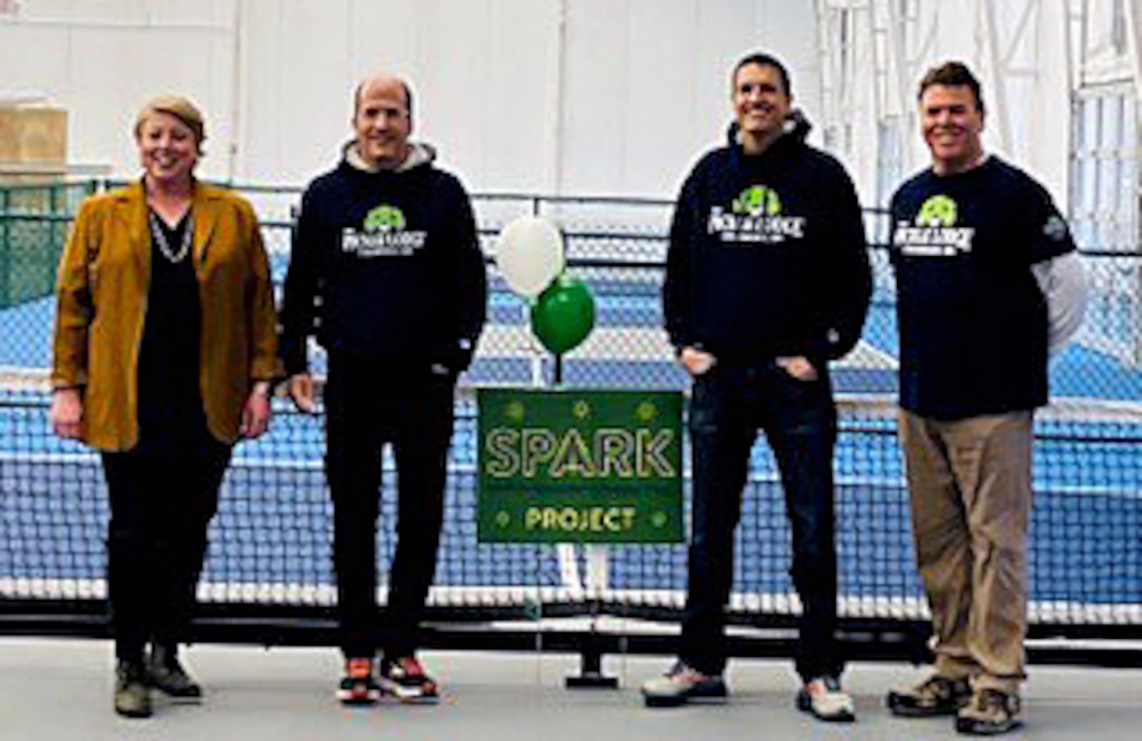 West Chester Twp. trustee Ann Beck join Mitch Dunn, Joe Frank, and Joe Saylor at the Pickle Lodge, which received a Spark grant to make improvements to the building’s exterior. Contributed photo