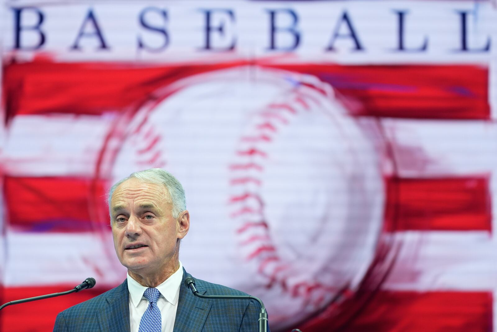 MLB Commissioner Rob Manfred speaks during the Baseball Hall of Fame awards presentation in Cooperstown, N.Y., Saturday, July 26, 2025. (AP Photo/Seth Wenig)