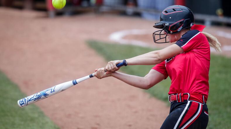 Lakota West’s Alyssa Triner gets a piece of the ball during the Division I state final against Massillon Perry on June 2 at Firestone Stadium in Akron. NICK GRAHAM/STAFF