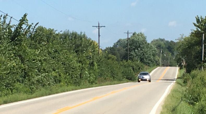 The death of an 18-year-old girl in a crash along this stretch of U.S. 42 in Warren County prompted an outcry for safety improvements from neighbors. STAFF/LAWRENCE BUDD