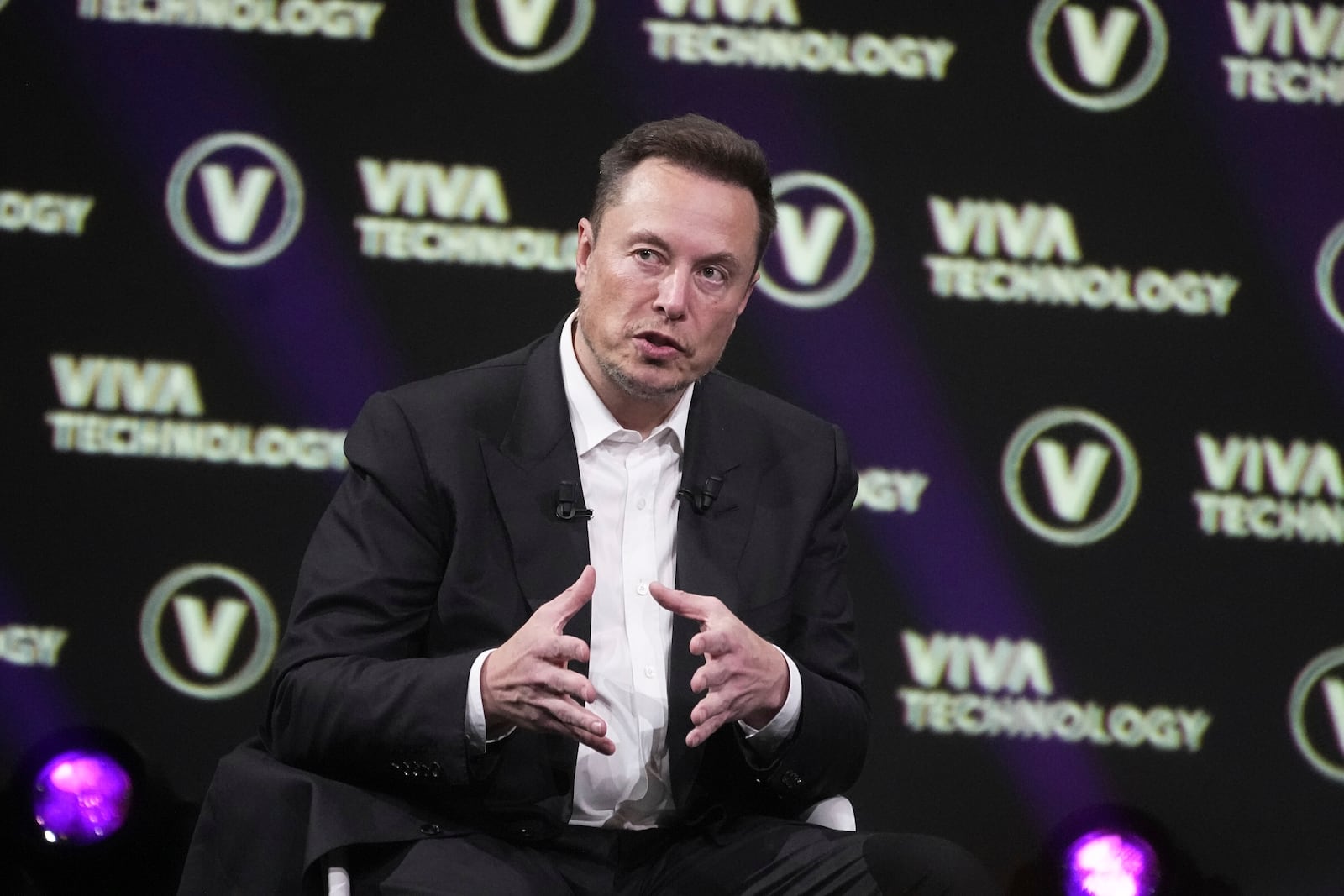 FILE - Elon Musk, who owns Twitter, Tesla and SpaceX, speaks at the Vivatech fair Friday, June 16, 2023 in Paris. Vivatech is Europe's biggest startup and tech event. (AP Photo/Michel Euler, File)