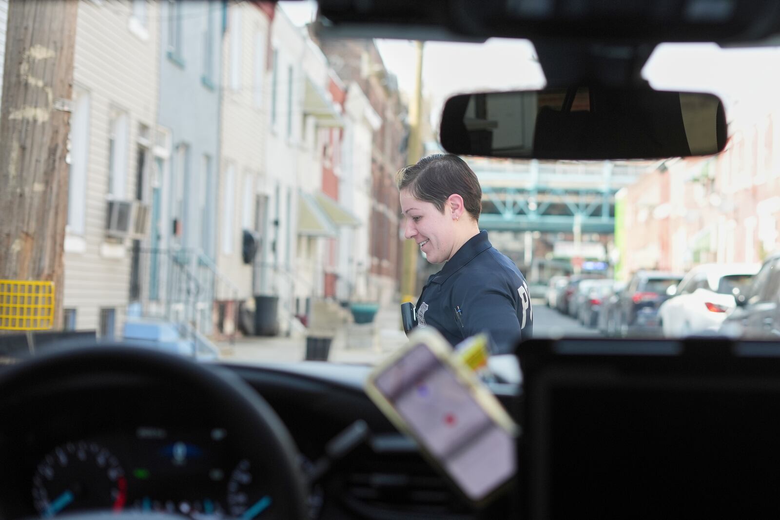 Crisis Intervention Response Team (CIRT) member Philadelphia Police Officer Vanity Cordero walks back to her vehicle after checking on a person, Philadelphia, Friday, March 14, 2025. (AP Photo/Matt Rourke)