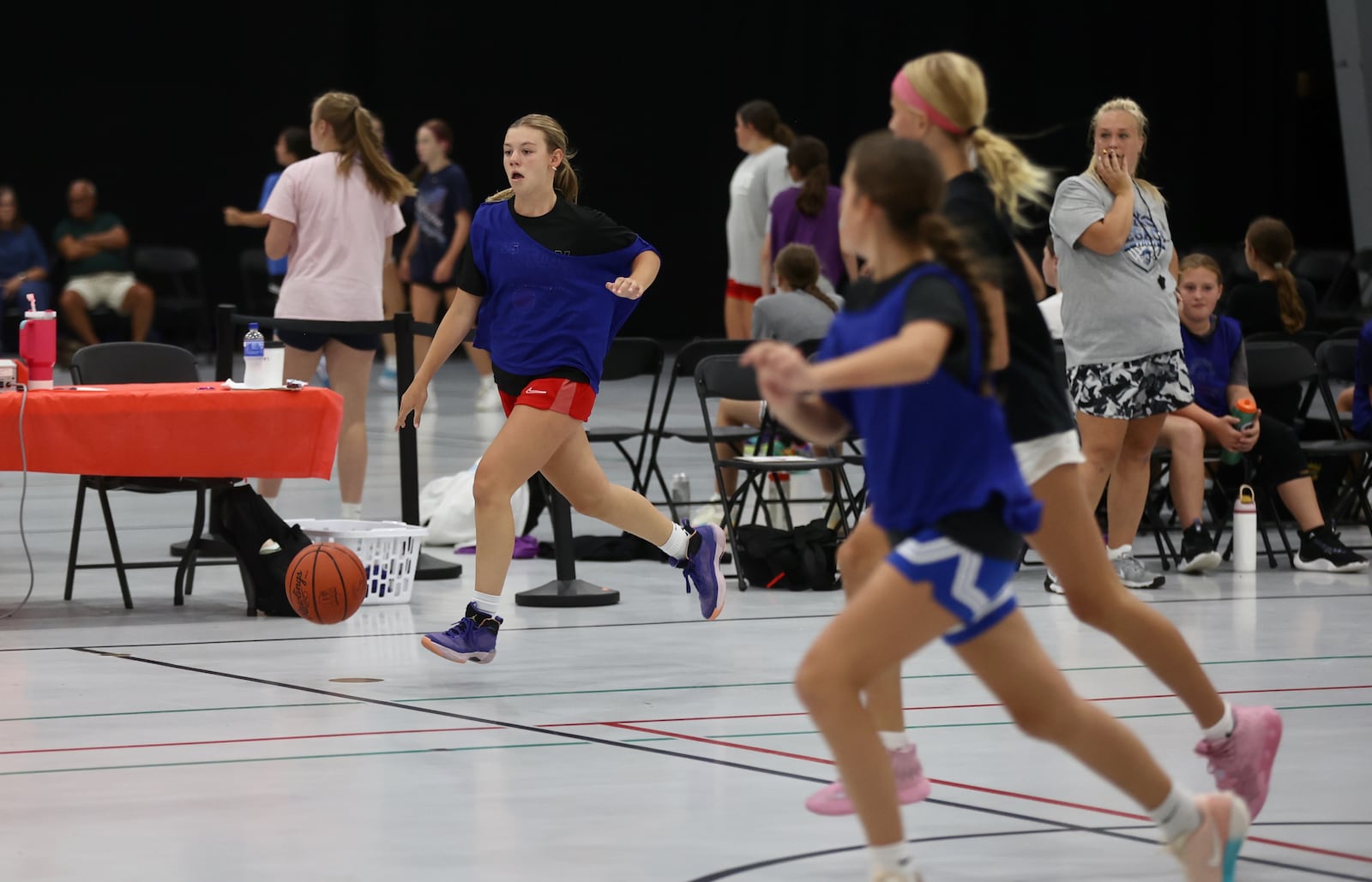 Girls play at the Luke Kennard Elite Basketball Camp on Saturday, July 19, 2025, at Camp Chautauqua in Miamisburg. David Jablonski/Staff