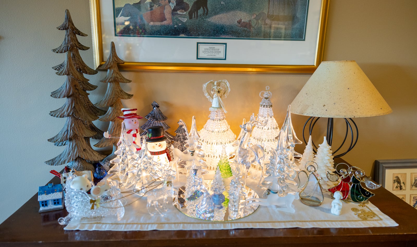 A crystal Christmas Village is seen in the home of Anita and Doug Wales of Miami Twp. The Wales fill every room with holiday decor each Christmas season. BRYANT BILLING/STAFF