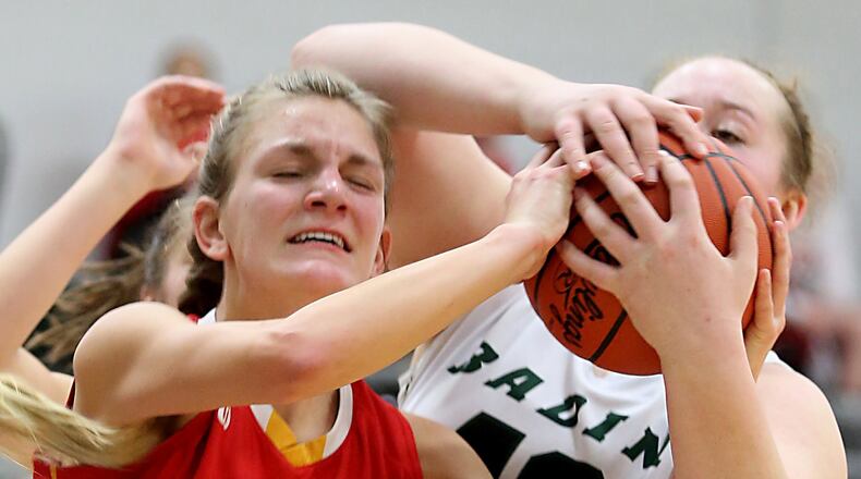 Fenwick center Jenna Adams and Badin forward Emma Broermann battle for a rebound during a game at Mulcahey Gym in Hamilton on Jan. 21, 2017. JOURNAL-NEWS FILE PHOTO