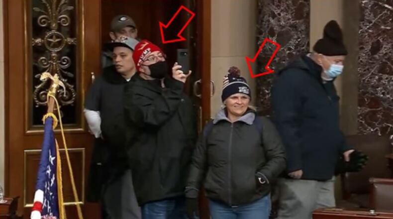 Shawndale Chilcoat (black beanie) and Donald Chilcoat (red beanie), shown in Capitol building security footage entering the Senate chambers. The photo was included in a federal criminal complaint filed with the U.S. District Court for the District of Columbia.