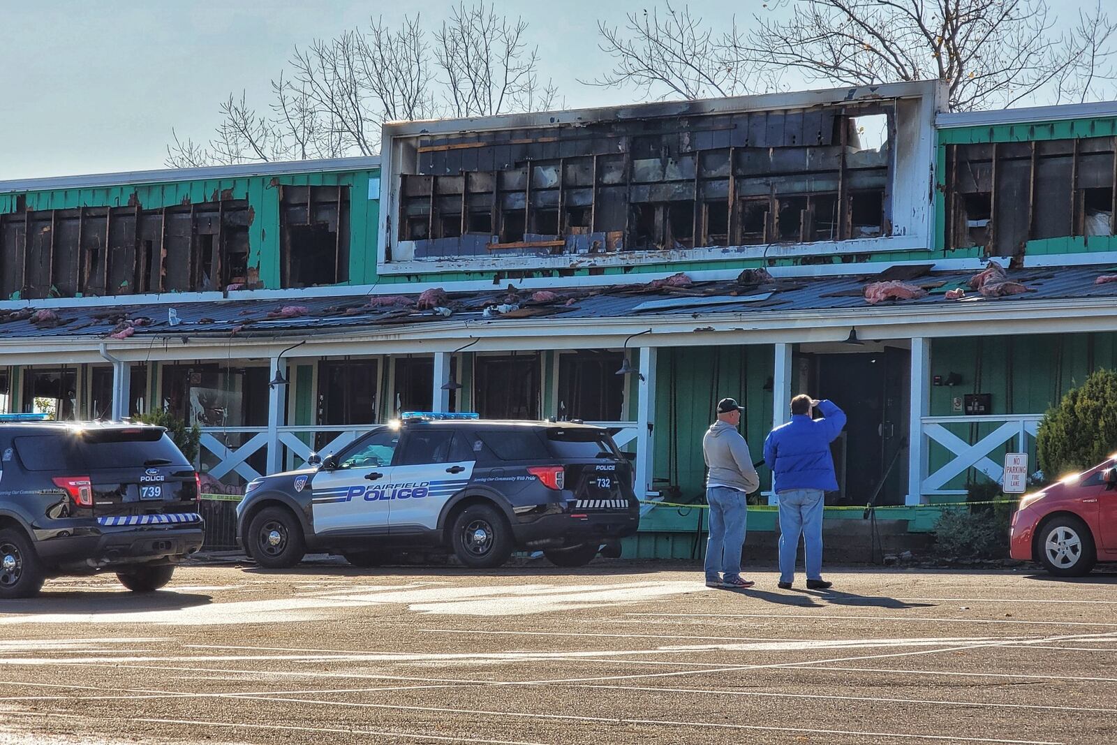 Fairfield fire units remain on the scene at Mango's Tropical Oasis on Dixie Highway after an early morning fire. Fire officials say the building is a total loss. NICK GRAHAM/STAFF