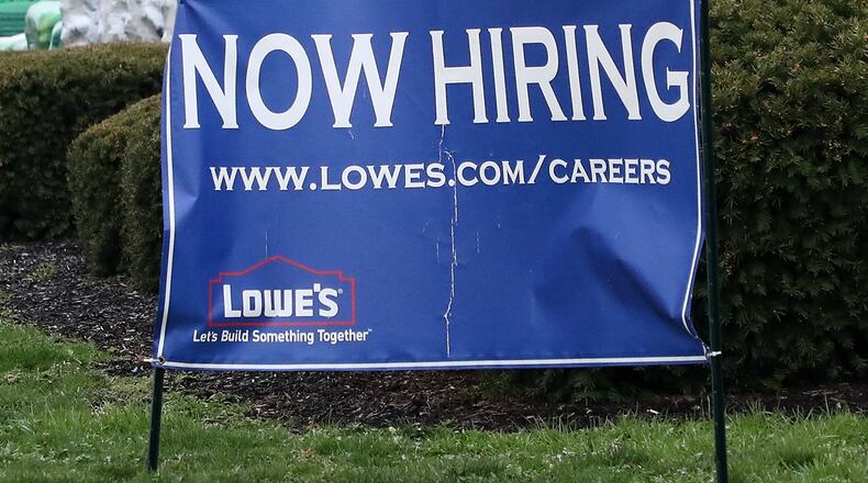 Lowe’s in Springfield had a ‘now hiring’ sign along Bechtle Avenue. BILL LACKEY/STAFF