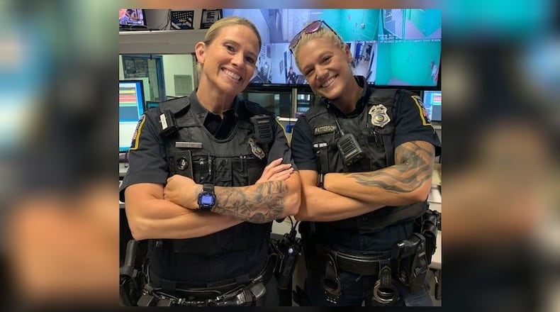 Middletown Police Officers Sheoki Reece and Jamie Patterson may show their tattoos while they are on duty. CONTRIBUTED/MIDDLETOWN POLICE DEPT.