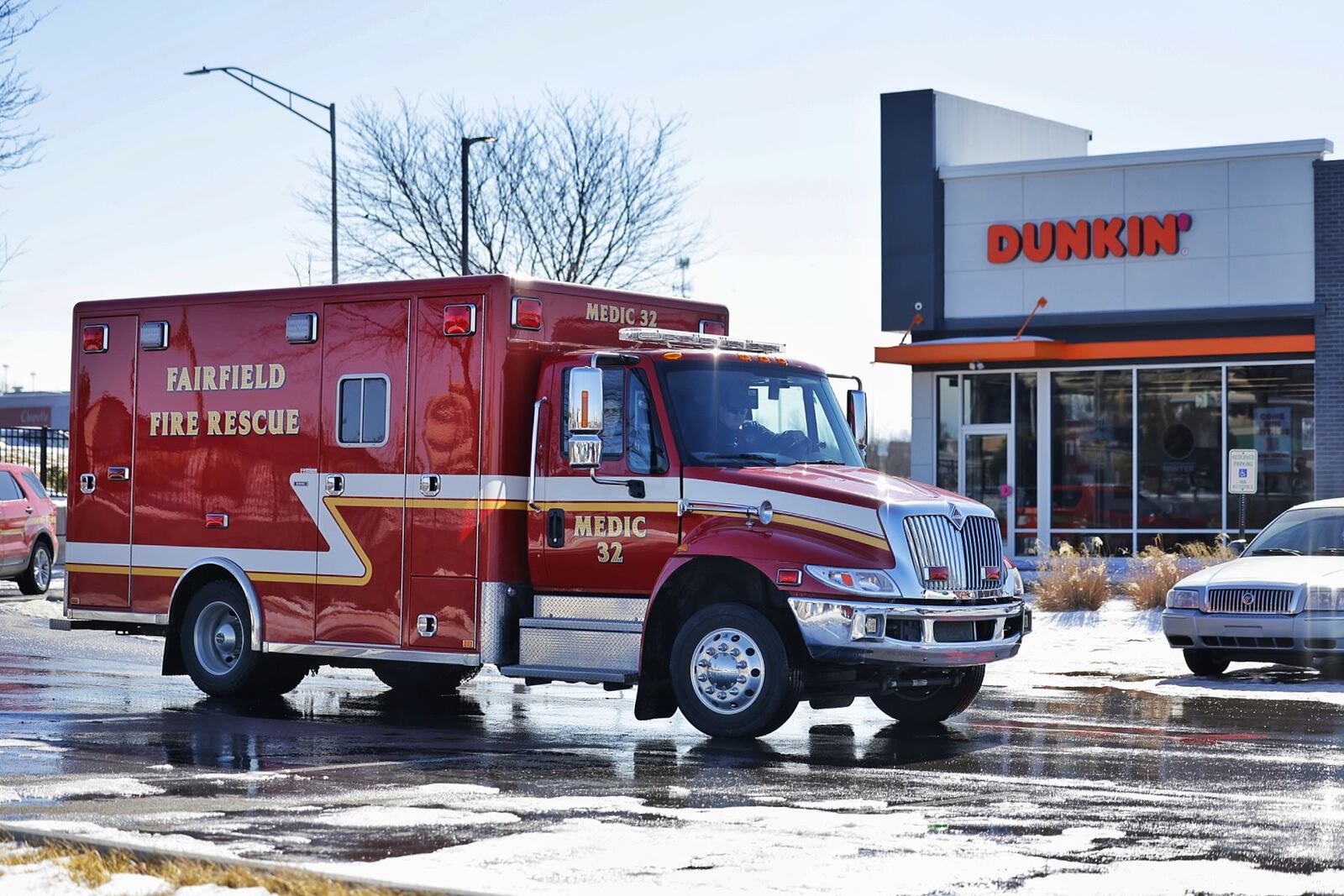 Fairfield first responders were called to Dunkin', 6315 S. Gilmore Road, Fairfield, for a report of a man who fell from a ladder. NICK GRAHAM/STAFF