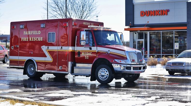 Fairfield first responders were called to Dunkin', 6315 S. Gilmore Road, Fairfield, for a report of a man who fell from a ladder. NICK GRAHAM/STAFF