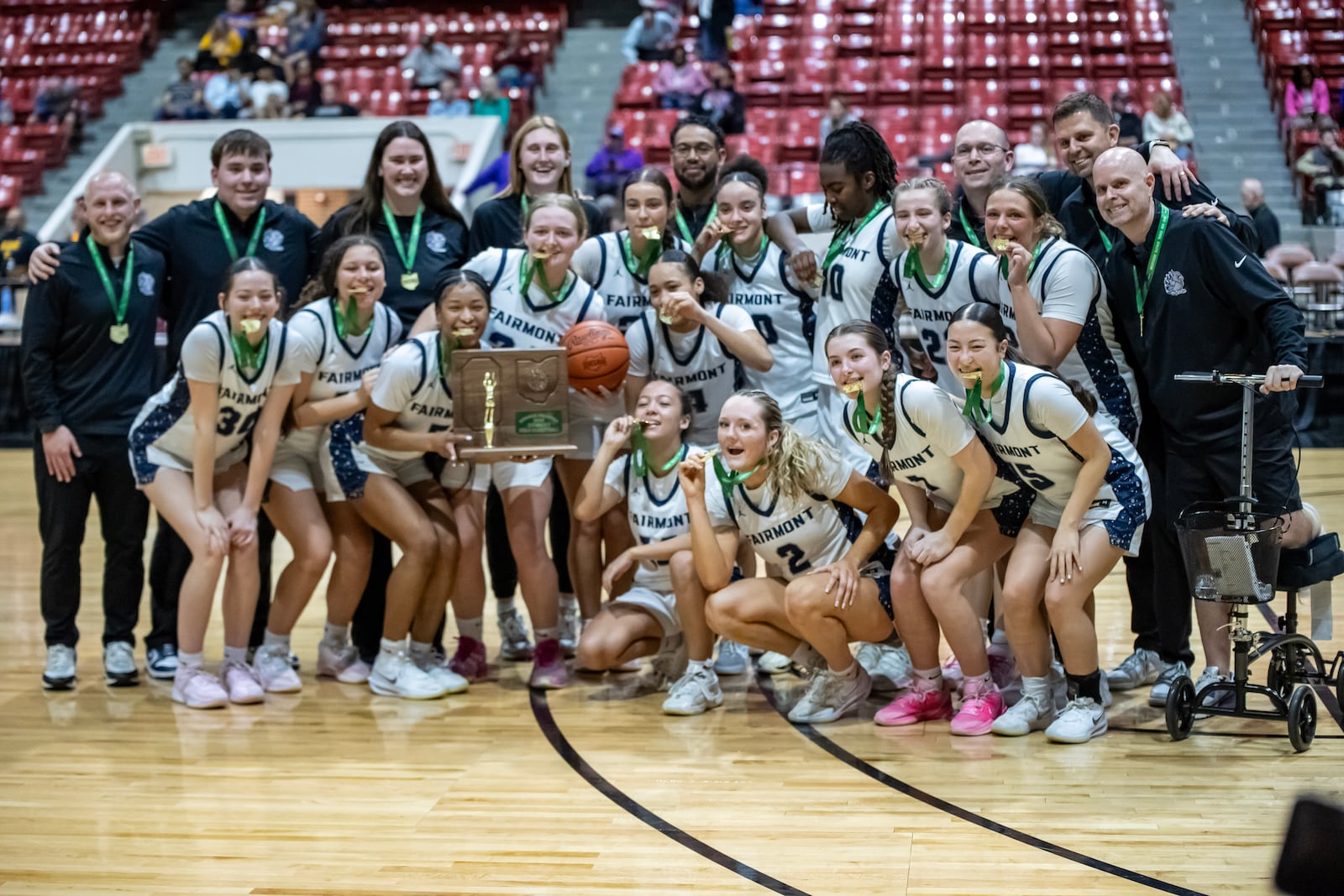 The Fairmont High School girls basketball poses with the trophy after beating Olentangy 66-45 to win the Division I, Region 2 championship on Friday, March 6, 2026 at the Ohio Expo Center's Taft Coliseum. MICHAEL COOPER / STAFF