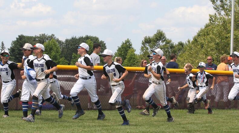 West Side celebrates after beating Galion and winning the Little League state tournament on Saturday, July 27, 2019, at Bevelhymer Park in New Albany. David Jablonski/Staff