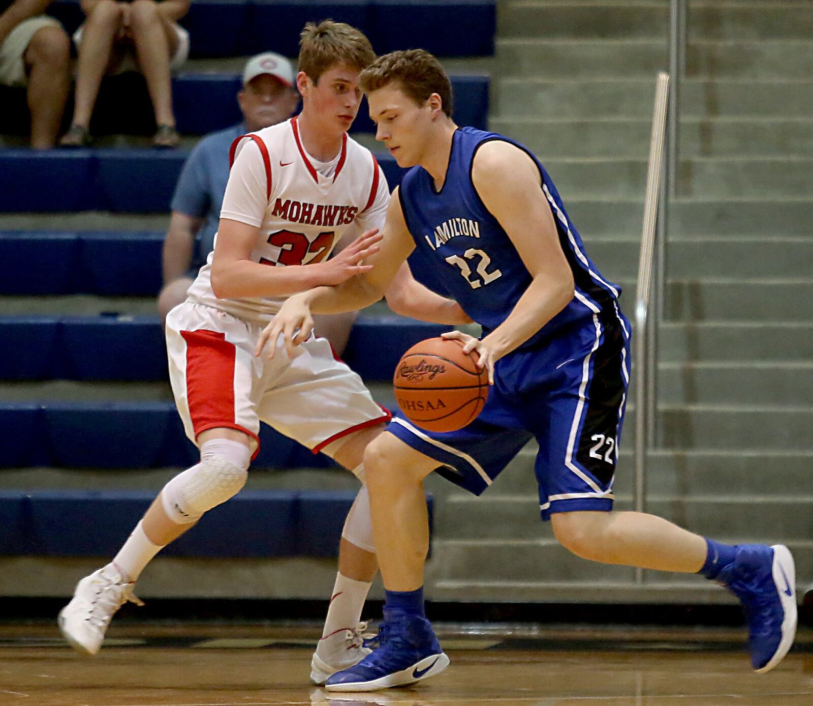 Hamilton’s Hunter Hamilton is defended by Madison’s Grant Whisman during the inaugural All-Butler County All-Star boys basketball game at the Hamilton Athletic Center on Saturday. CONTRIBUTED PHOTO BY E.L. HUBBARD