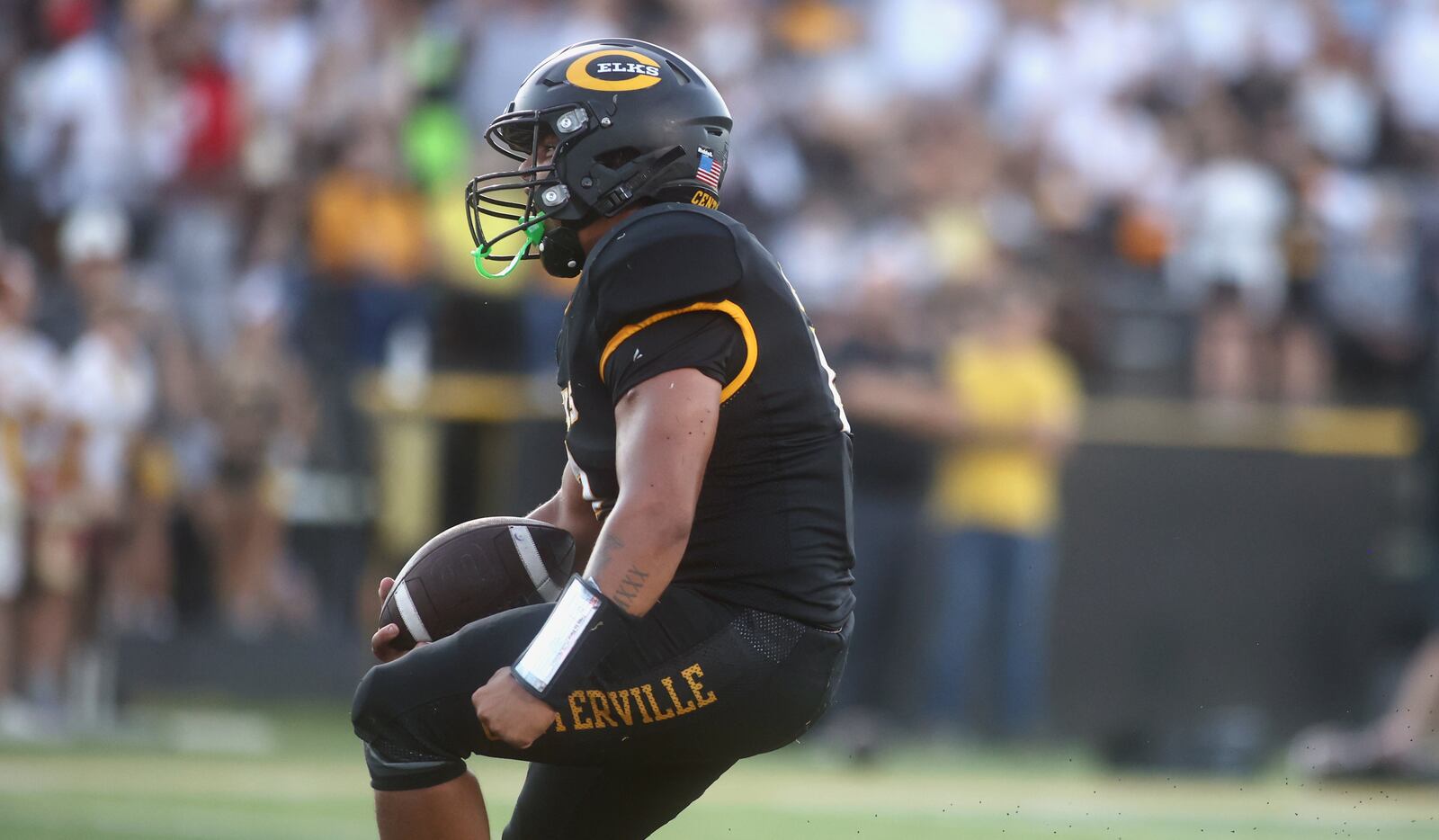 Centerville's Parker Johnson scores a touchdown against Lakota East on Friday, Aug. 22, 2025, at Centerville Stadium. David Jablonski/Staff