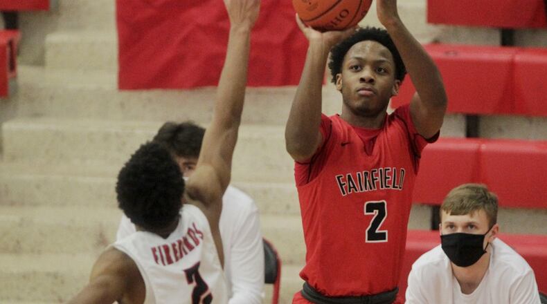 Fairfield's Deshawne Crim puts up a shot during Friday's game at Lakota West. The Indians won 81-76 in double overtime. Nick Graham/STAFF