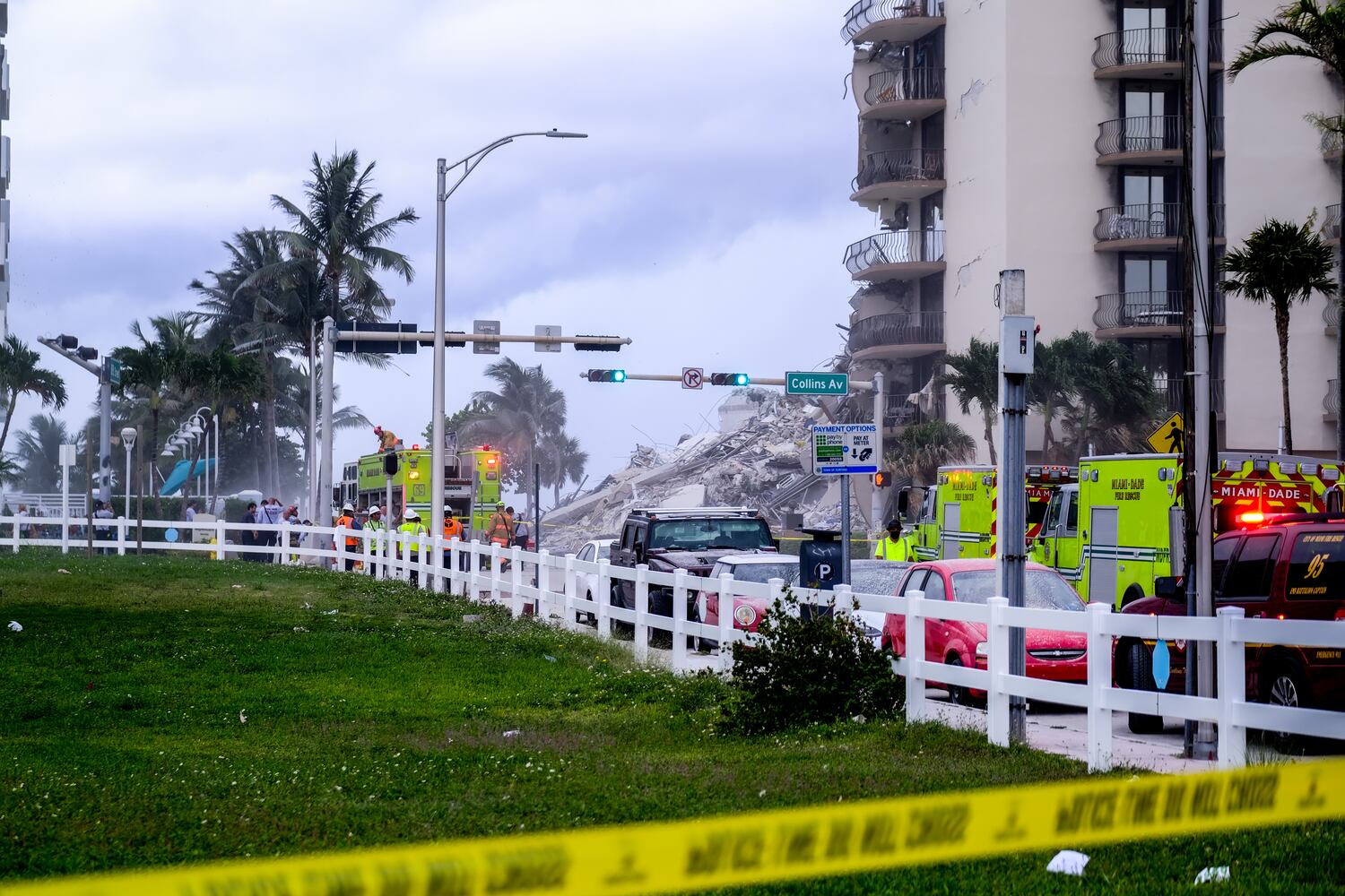 First responders arrive on the scene of a high-rise residential building that partially collapsed in Surfside, Fla., Thursday, June 24, 2021. (Maria Alejandra Cardona/The New York Times)