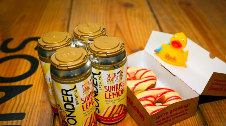 Deerfield Twp. businesses Sonder Brewing and Duck Donuts are teaming up to release a limited-edition beer Sunrise Lemon Berliner Weisse. It will be available starting Friday, Nov. 29, 2019, at the brewery at 8584 Duke Blvd. GREG LYNCH/STAFF