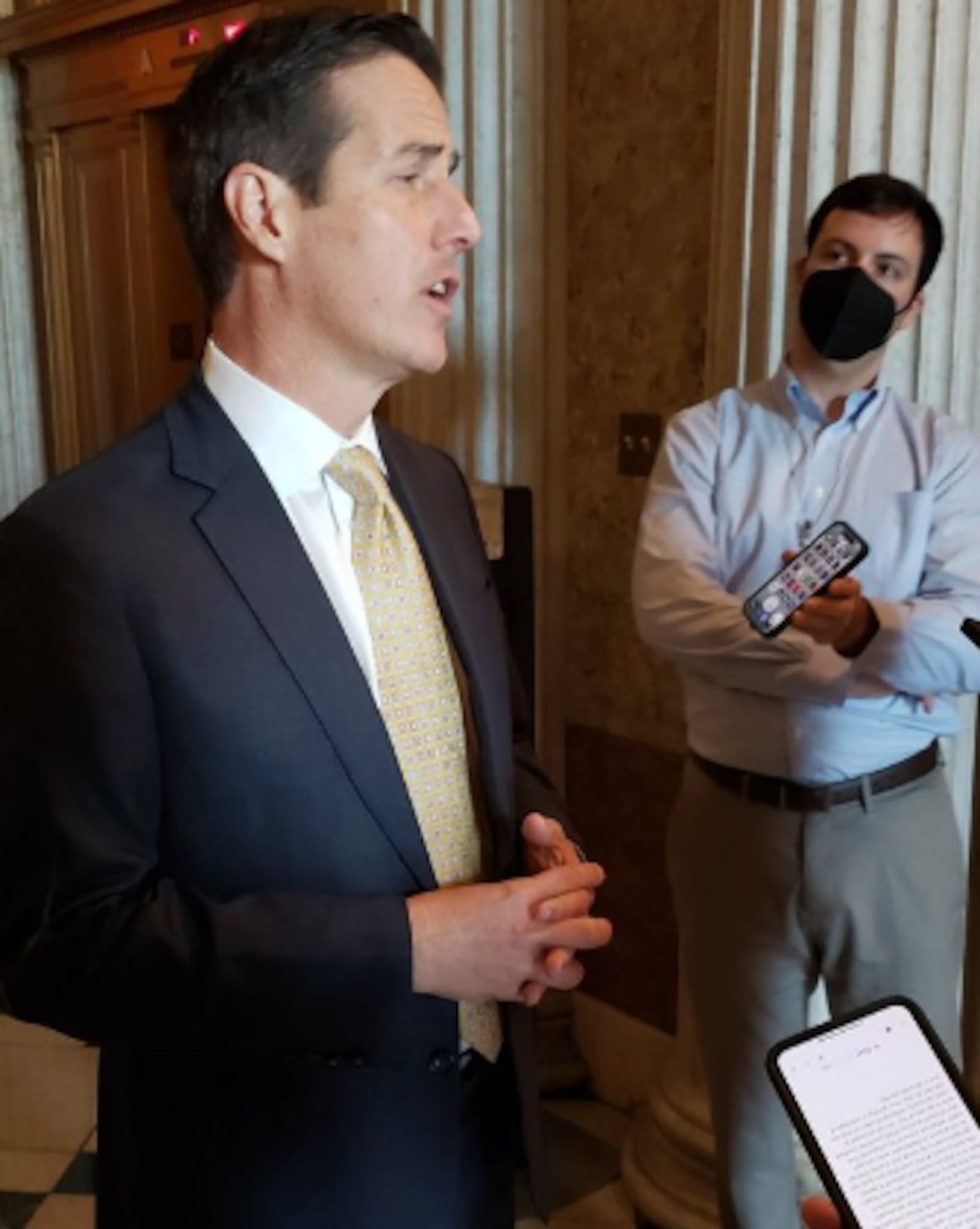 Ohio's U.S. Sen. Bernie Moreno talks to reporters in the halls of Congress in August 2025. Photo credit Jamie Dupree.
