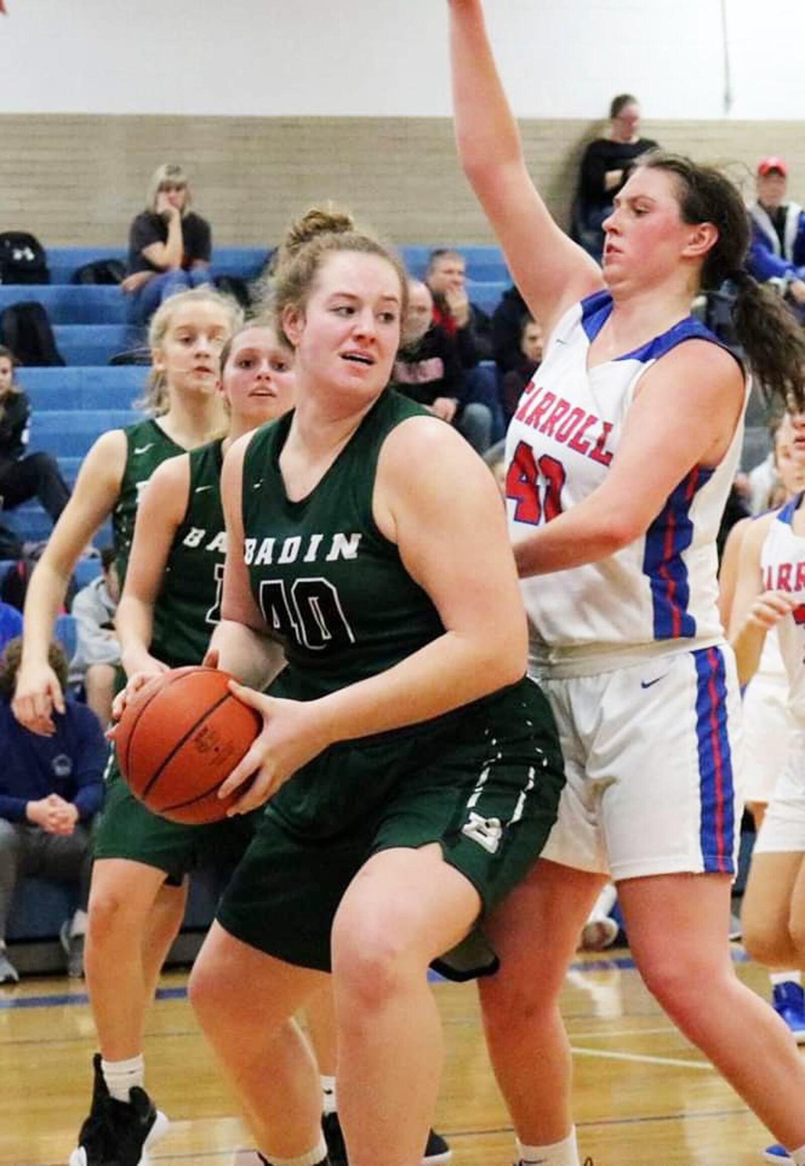 Badin’s Emma Broermann (40) works down low against Carroll’s Julia Keller (42) during Saturday afternoon’s game in Riverside. Carroll won 64-57. CONTRIBUTED PHOTO BY TERRI ADAMS