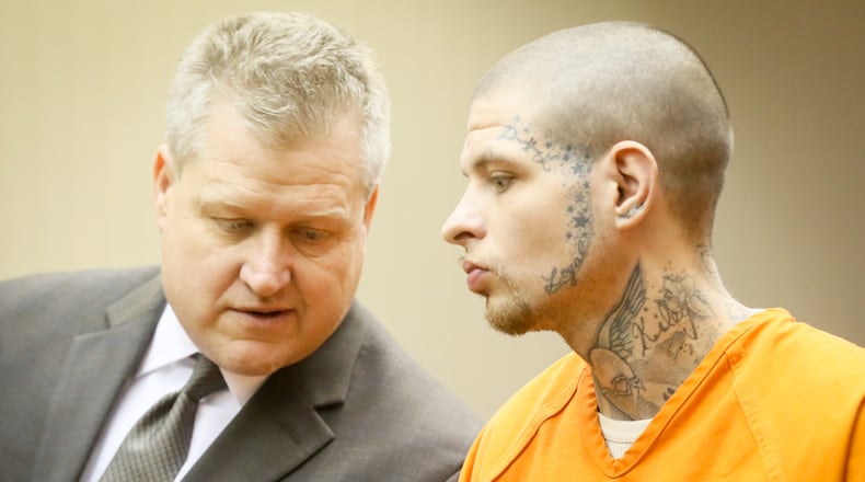 Charles Graham, charged with attempted burglary and participating in criminal gang, in connection with the murders of Tiffany Hoskins and Joe Romano, appears in Butler County Common Pleas Court with his attorny Jim Hardin. GREG LYNCH / STAFF