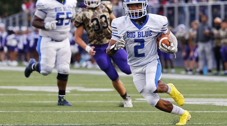 Hamilton’s Semaj Aldridge carries the ball for a touchdown during their football game against Middletown Friday, Sept. 2, 2022 at Barnitz Stadium in Middletown. Hamilton won 17-0. NICK GRAHAM/STAFF