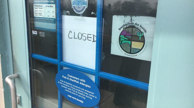 A “closed” sign is posted on the doors of Long John Silver’s, 1304 S. Breiel Blvd in Middletown. RICK MCCRABB/STAFF