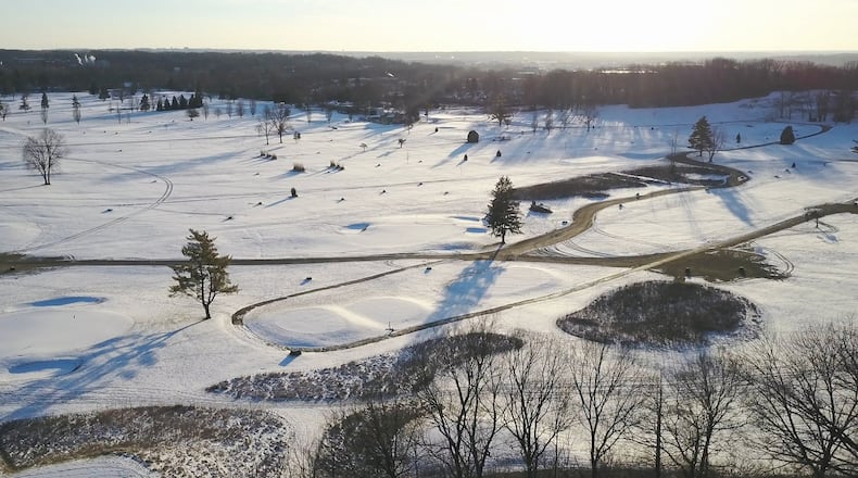 Community Golf Course is blanketed in snow. The low winter sun casts long shadows from trees standing along the fairways as seen from SKY 7. ERIC DIETRICH / STAFF