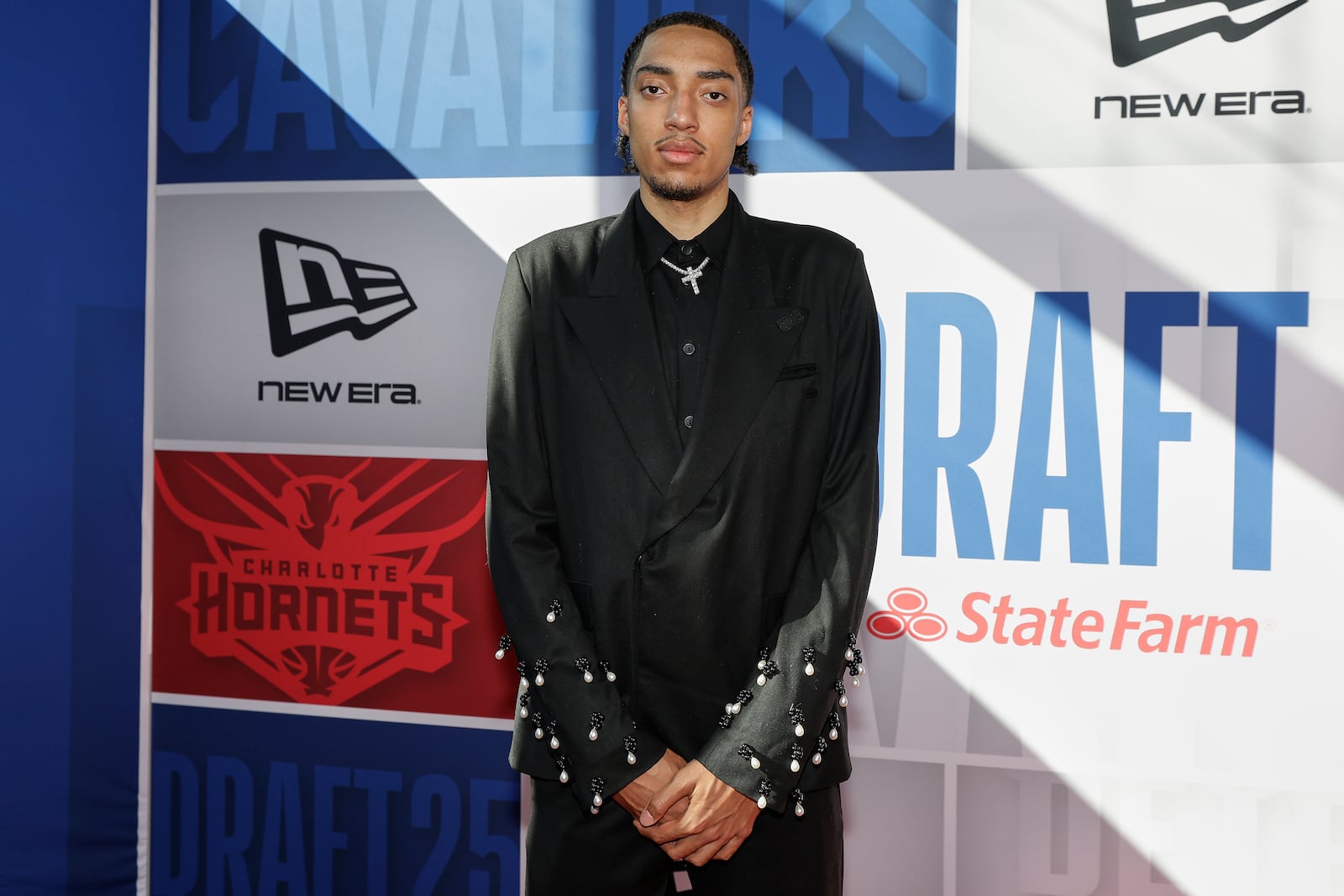 Noa Essengue arrives for the first round of the NBA basketball draft, Wednesday, June 25, 2025, in New York. (AP Photo/Adam Hunger)