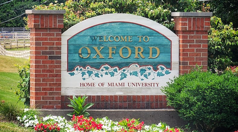 A sign welcomes visitors as they enter Oxford. NICK GRAHAM/STAFF