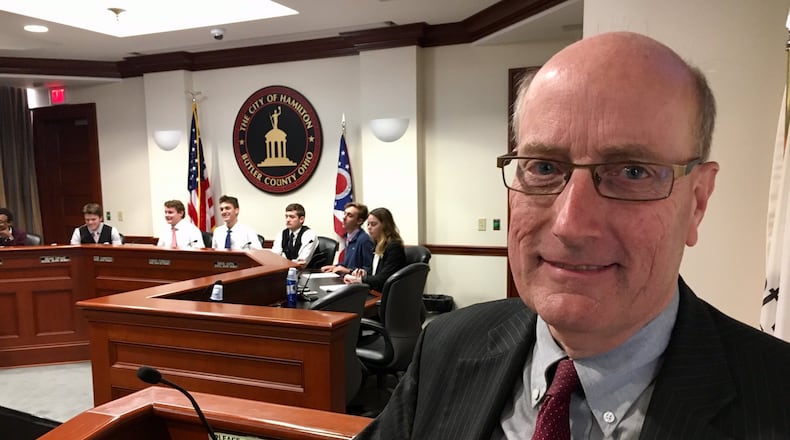 Hamilton Mayor Pat Moeller watched in 2011 as city council was taken over by teens from Hamilton and Badin High Schools for mock council and school board meetings in the downtown chambers as part of Civics Day in the city. He’s one of 12 candidates in a charity competition to get pies thrown in their faces. MICHAEL D. CLARK/STAFF
