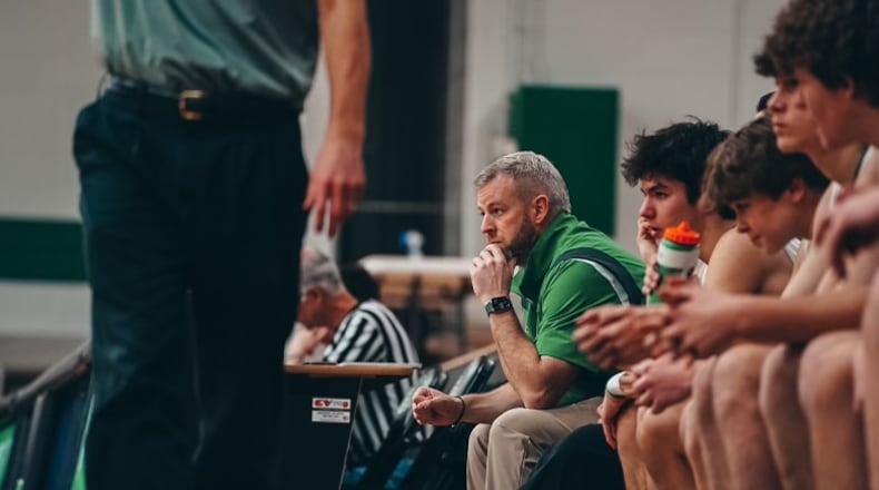 Badin coach Ben Cosgrove sits on the bench during a recent game. Matt Grimes/CONTRIBUTED